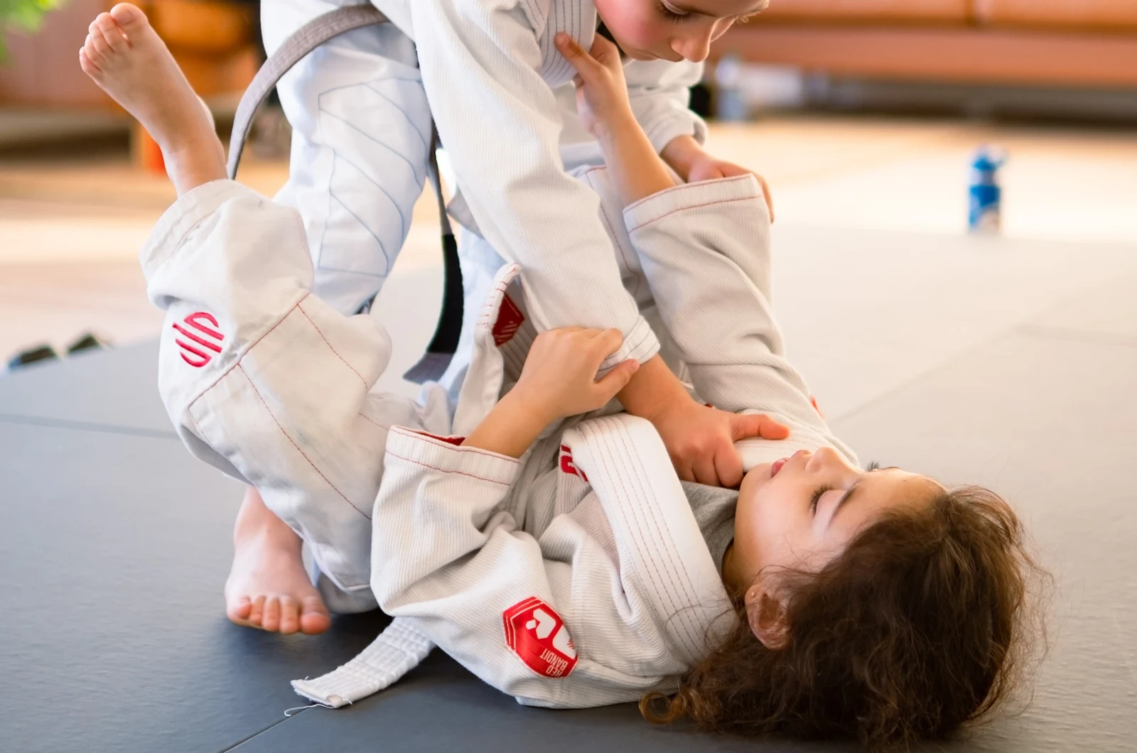 Kids learning sportsmanship through martial arts